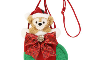 プルートがクリスマスセーターを着たぬいぐるみ「ディズニー